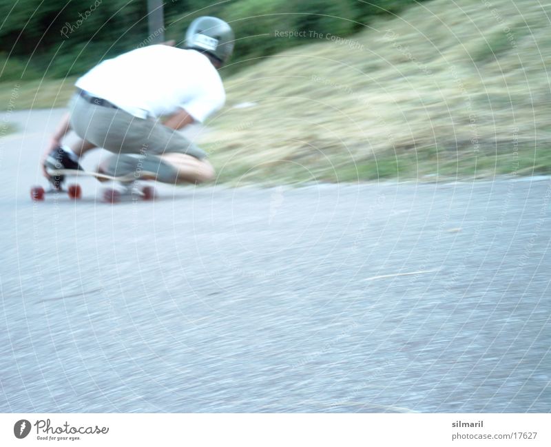 In action III Skateboarding Action Leisure and hobbies Speed Asphalt Helmet Sports longboard fun Jeans Coil Cool (slang)
