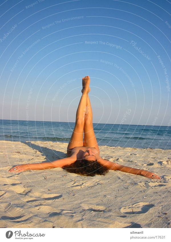 Up your legs I Relaxation Leisure and hobbies Vacation & Travel Beach Ocean Woman Adults Legs Sand Water Fitness Lie Gymnastics Colour photo
