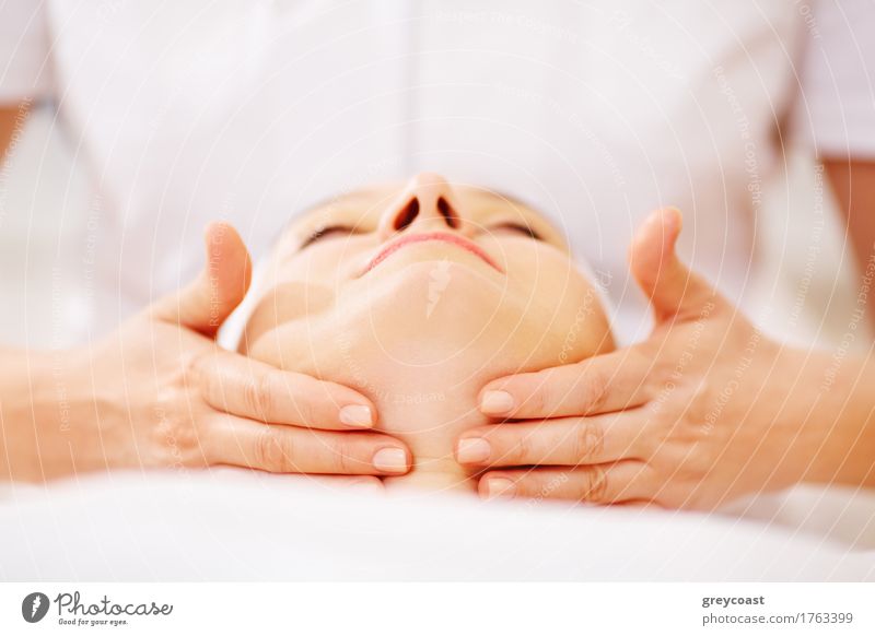 Close-up shot of woman on seance of facial massage with accent on chin Skin Face Health care Medical treatment Relaxation Spa Massage Doctor Woman Adults Hand 2