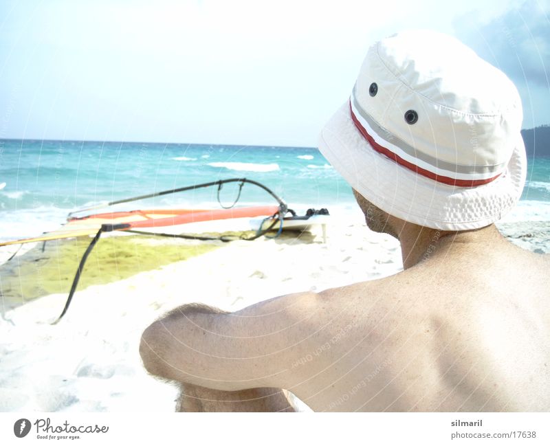 Still wind II Beach Ocean Man Leisure and hobbies Vacation & Travel Horizon Surfboard Cap Thought Think Water Sand Relaxation Sky Hat Back Sit