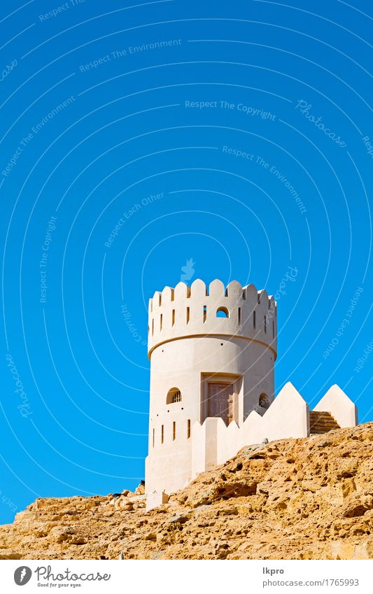 r brick in oman muscat the old defensive Vacation & Travel Tourism Sky Climate Hill Rock Small Town Castle Building Architecture Monument Stone Old Hot Gray