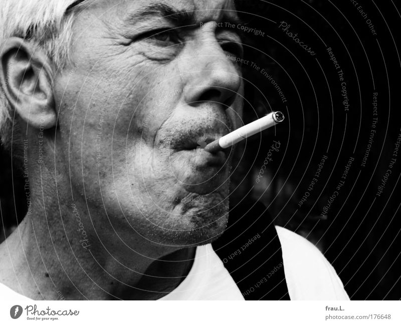 extreme smoking Black & white photo Exterior shot Day Shallow depth of field portrait Looking away Leisure and hobbies Trip Summer Human being Masculine Man