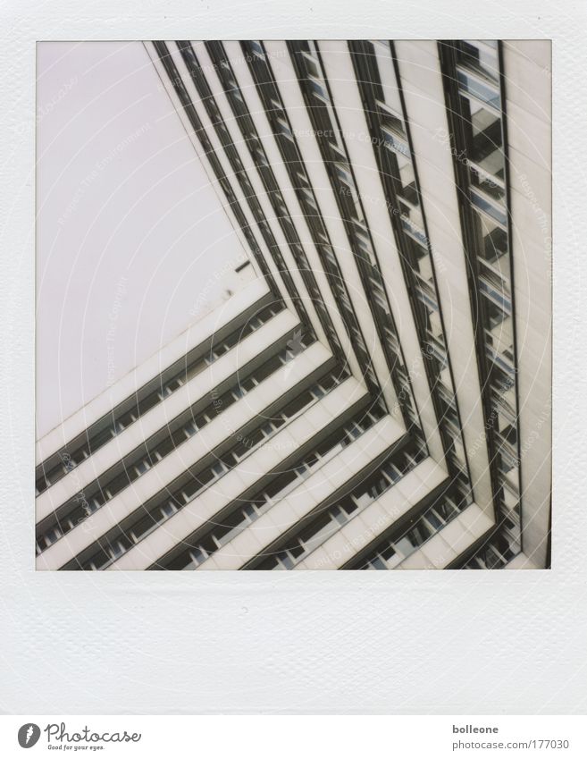 very oblique Colour photo Subdued colour Polaroid Copy Space left Day Town Deserted High-rise Manmade structures Building Architecture Facade Sharp-edged Cold