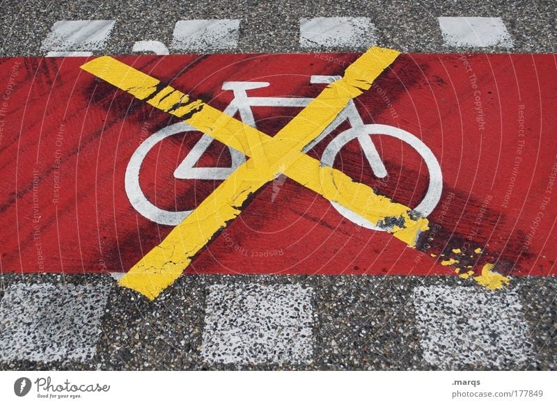 End of terrain Colour photo Exterior shot Downward Transport Means of transport Traffic infrastructure Passenger traffic Street Cycle path Bicycle Sign