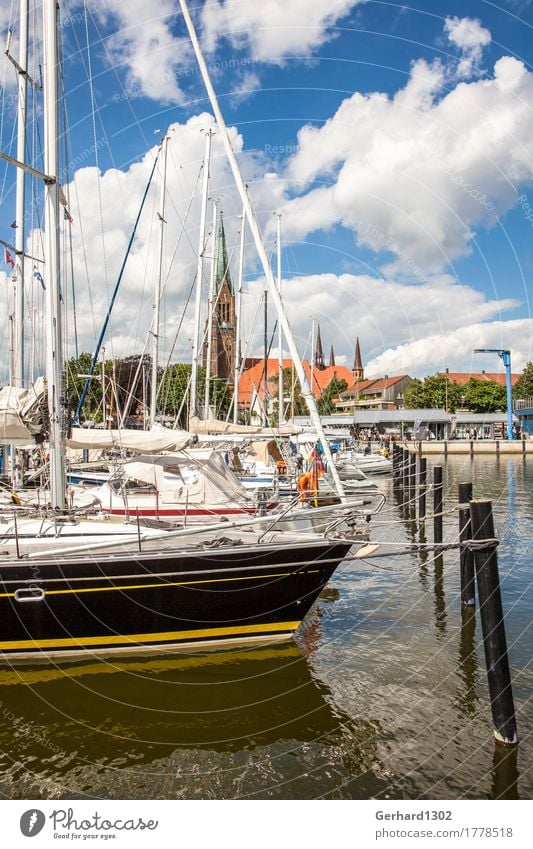 Marina of Schleswig with the Schleswiger Dom in the background Leisure and hobbies Vacation & Travel Tourism Summer Ocean Aquatics Sailing Nature Water Sun