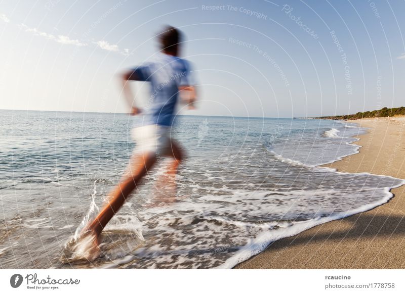 man running barefoot on the border of the sea Joy Relaxation Vacation & Travel Summer Beach Ocean Waves Sports Jogging Man Adults Nature Landscape Coast
