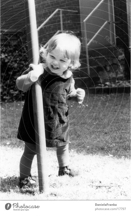 Catch me! Toddler Girl Child Grass Joy Black & white photo Laughter Walking Exterior shot
