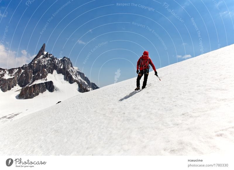 A mountaineer on the way for reach the summit. Chamonix, France Joy Adventure Expedition Winter Snow Mountain Sports Climbing Mountaineering Success Man Adults