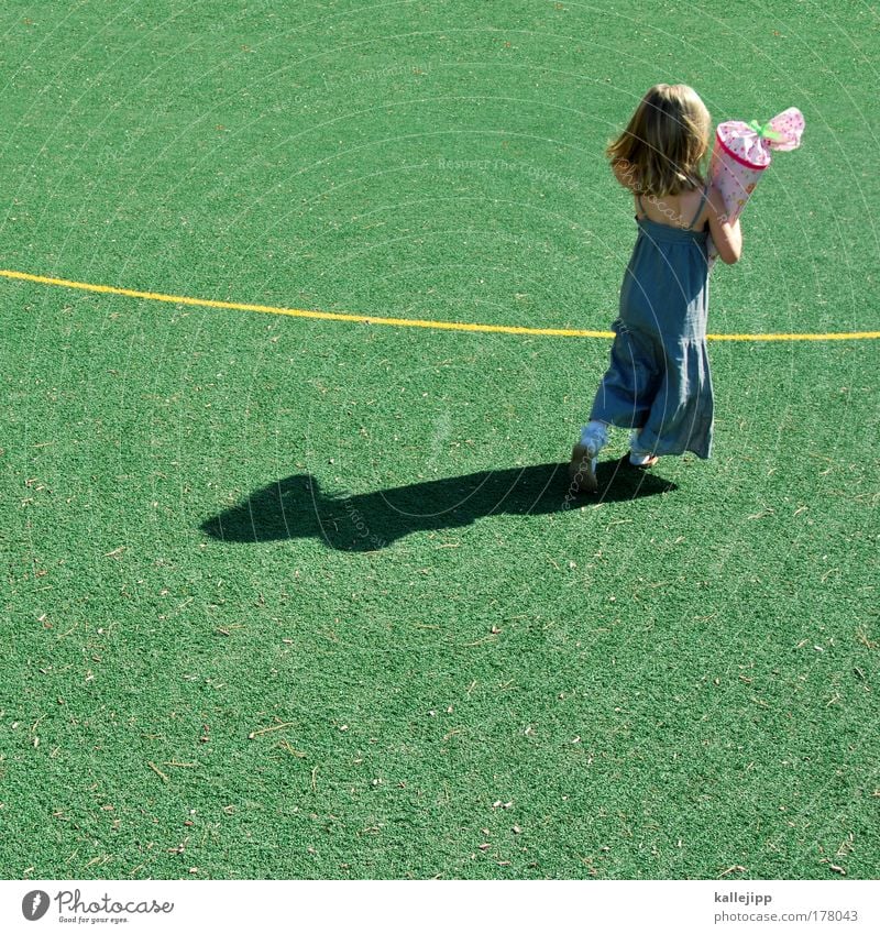 Good luck. Colour photo Multicoloured Exterior shot Copy Space bottom Day Light Shadow Contrast Sunlight Full-length Rear view Football pitch Parenting