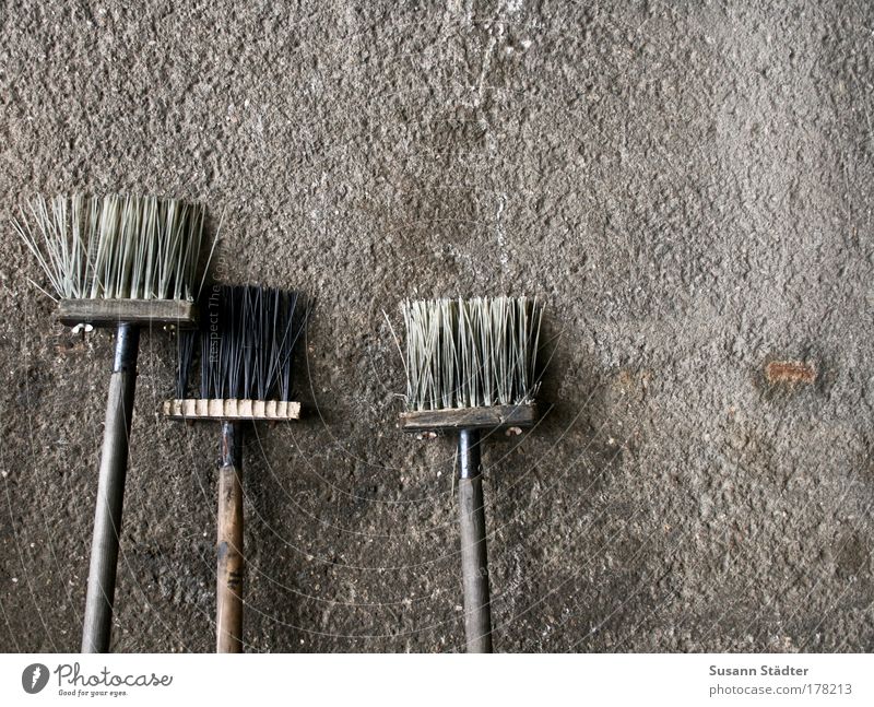 Old brooms sweep well Subdued colour Exterior shot Detail Deserted Copy Space right Copy Space top Copy Space bottom Day Light Shadow Contrast Silhouette