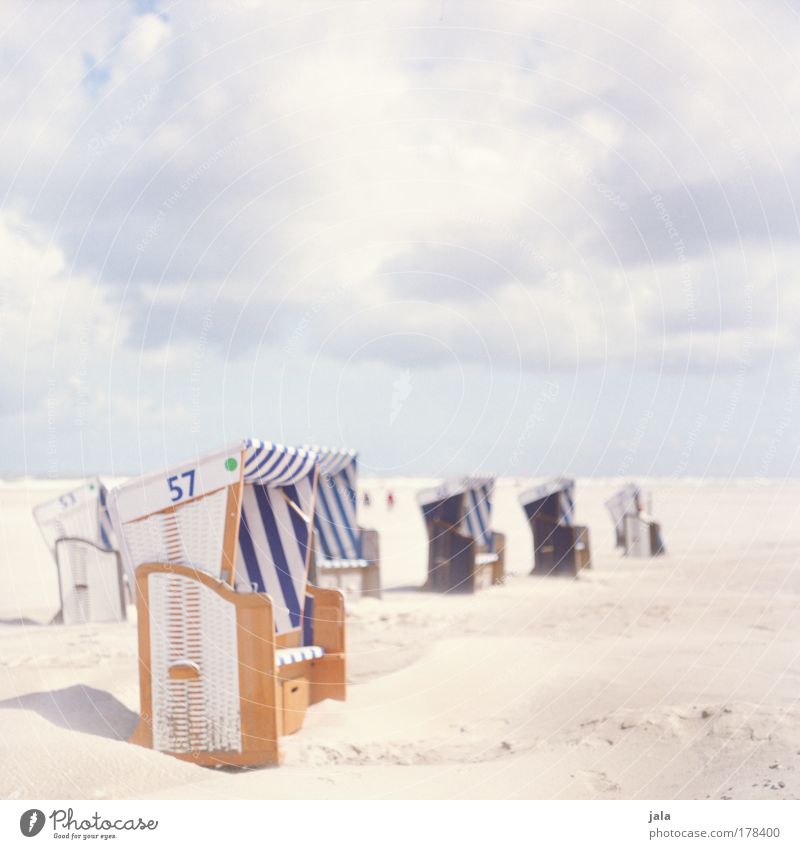 beach chair whispering Colour photo Exterior shot Copy Space top Day Light Landscape Sky Clouds Beautiful weather Beach North Sea Ocean To enjoy Bright Blue