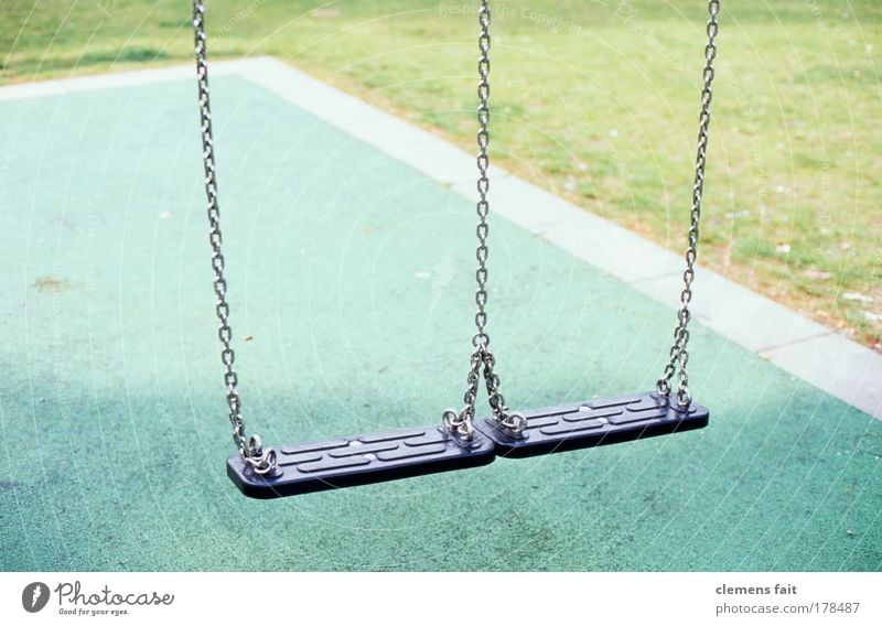 playground Colour photo Exterior shot Deserted Copy Space top Morning Light Shallow depth of field Playground To swing Green Black Calm Infancy Swing Lawn Chain