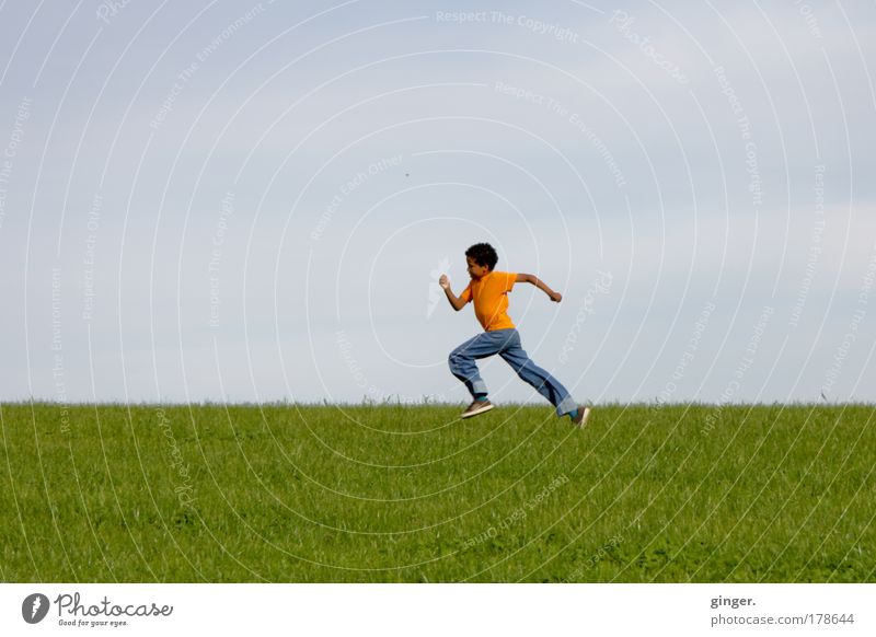 Halfway, almost... (boy sprinting across the meadow) Leisure and hobbies Human being Masculine Boy (child) 1 8 - 13 years Child Infancy Nature Landscape Sky