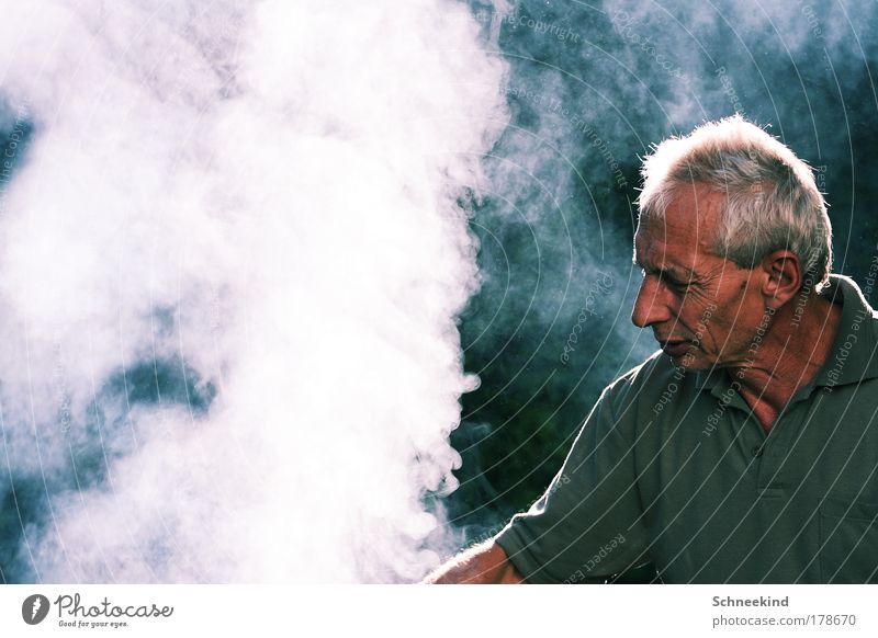 Daddy the grill master! Colour photo Exterior shot Copy Space left Day Light Shadow Contrast Shallow depth of field Central perspective Portrait photograph