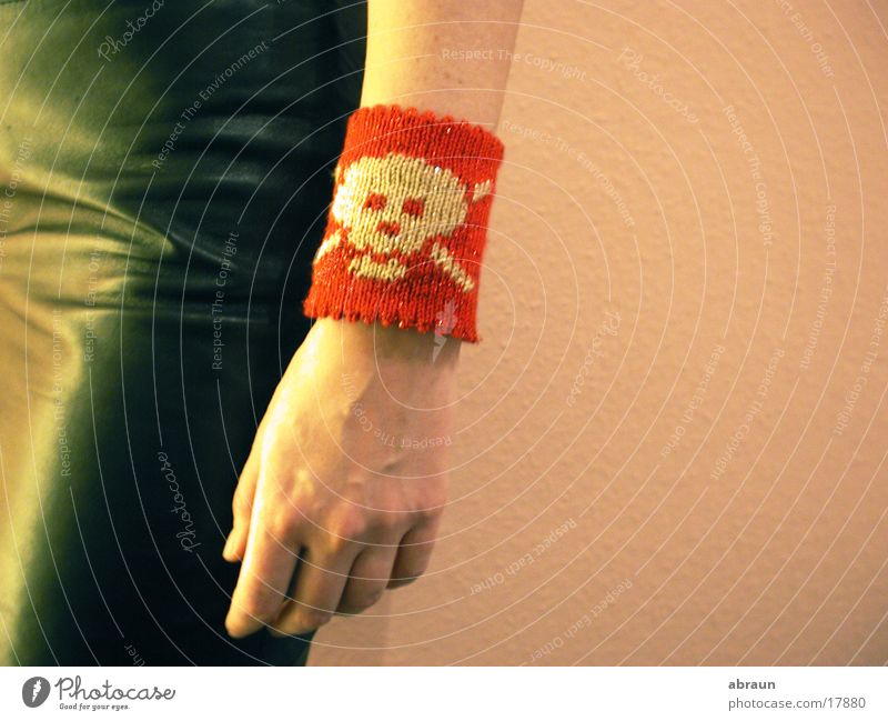 bracelet with skull Red Pink Obscure Death's head sweatband Arm Close-up