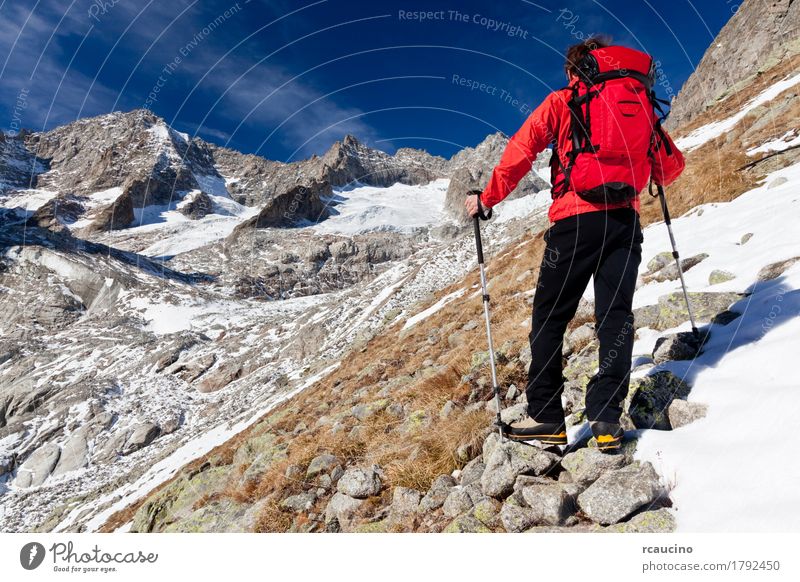Hiker observing a high mountain panorama. Mount Blanc, Italy Adventure Snow Mountain Hiking Sports Boy (child) Man Adults Nature Landscape Sky Clouds Autumn