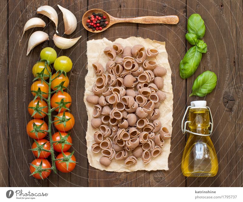Whole spelt pasta, vegetables, herbs and olive oil Vegetable Dough Baked goods Herbs and spices Cooking oil Nutrition Vegetarian diet Diet Bottle Spoon Dark