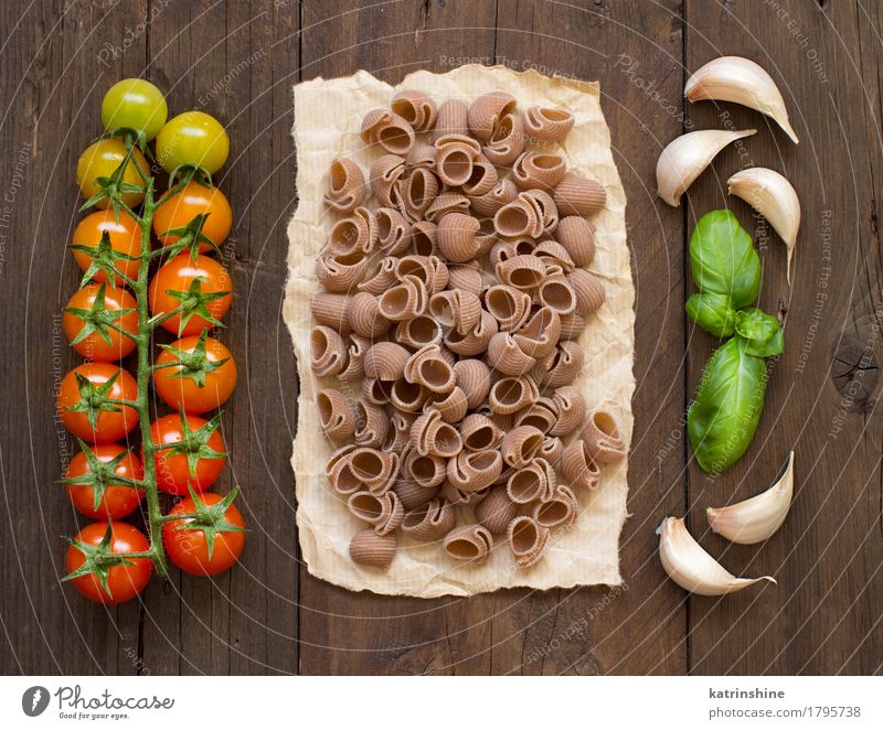 Raw conchiglie pasta, basil and vegetables Vegetable Dough Baked goods Herbs and spices Vegetarian diet Diet Fresh Healthy Brown Green Red Basil food