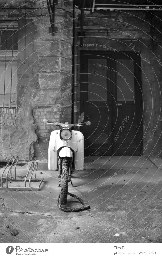 Backyard Berlin Prenzlauer Berg Town Capital city Downtown Old town Deserted Decline Past Transience Lose Scooter Door East Black & white photo Exterior shot