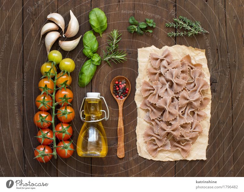 Whole wheat pasta, vegetables, herbs and olive oil Vegetable Dough Baked goods Herbs and spices Cooking oil Vegetarian diet Diet Bottle Spoon Dark Fresh Brown