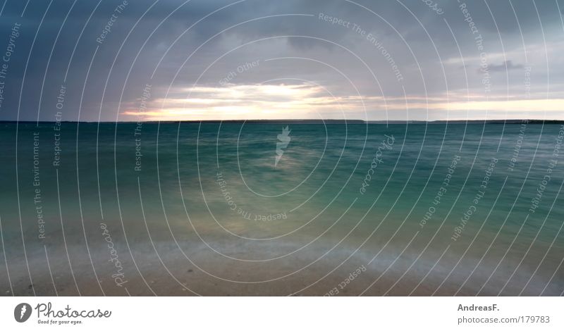 Wind and weather Colour photo Exterior shot Copy Space bottom Evening Twilight Sunset Long exposure Motion blur Summer Beach Waves Sailing Environment Nature