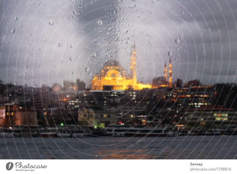 view of the mosque with evening lights through the window Ocean Landscape Rain Town Building Ferry Watercraft Drop Yellow Islam the religion East Asia turkey