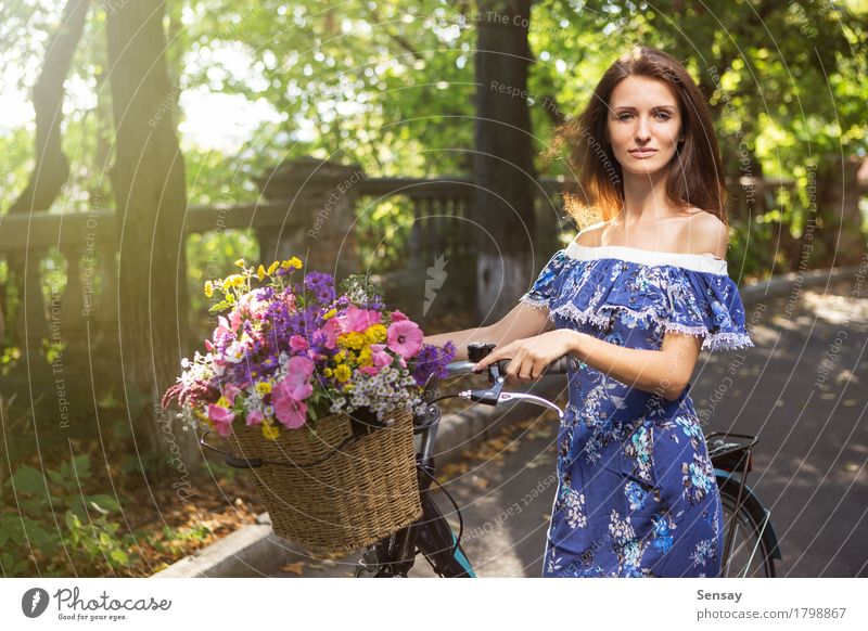 Girl with a bicycle and a basket of flowers Happy Beautiful Body Vacation & Travel Trip Summer Sun Human being Woman Adults Nature Landscape Sky Tree Flower
