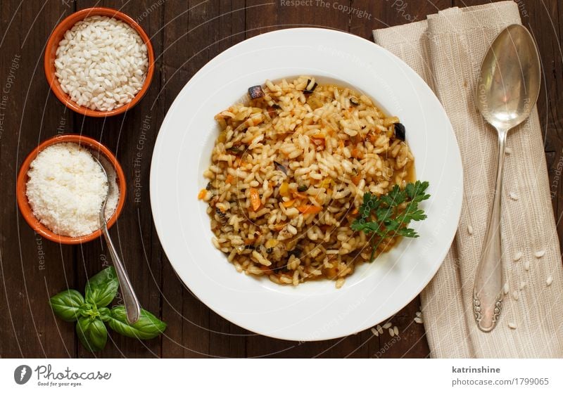 Risotto with vegetables and spices Vegetable Grain Herbs and spices Nutrition Lunch Dinner Vegetarian diet Diet Italian Food Plate Spoon Healthy Delicious cook