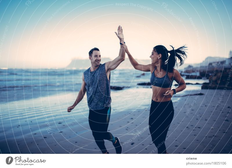 Fit Couple giving each other high five Lifestyle Body Healthy Health care Athletic Fitness Leisure and hobbies Beach Sports Sports Training Jogging Human being