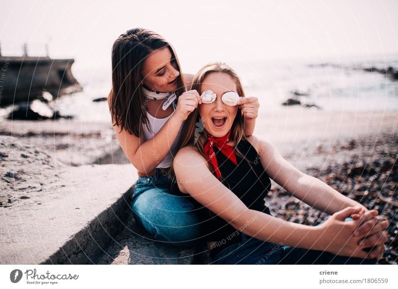 Teenager girls having fun pulling faces at the beach Lifestyle Joy Happy Summer Beach Ocean Human being Girl Woman Adults Sister Friendship Couple