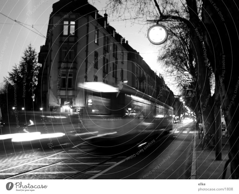 street life House (Residential Structure) Tram Overexposure Railroad tracks Tree Transport Car Black & white photo
