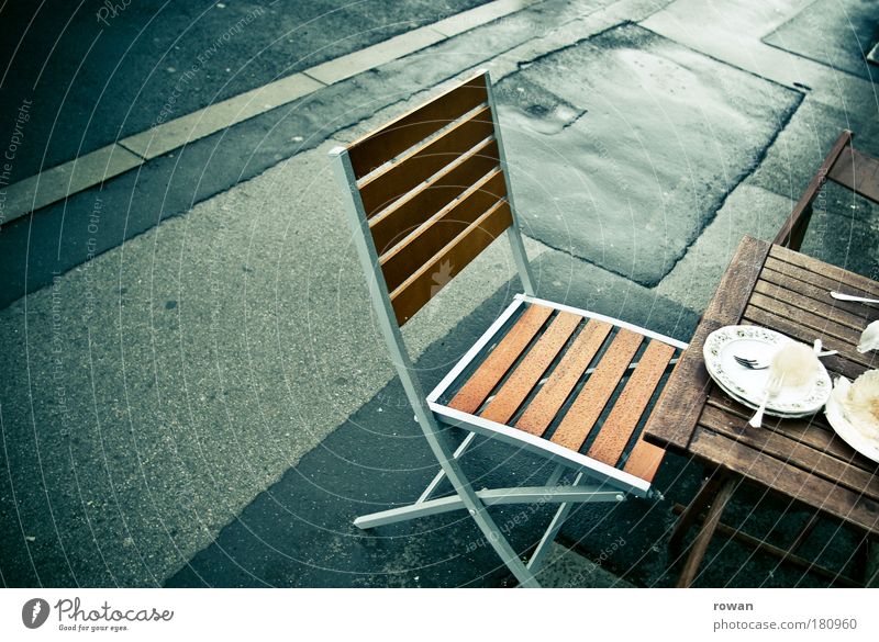 street cafe Colour photo Exterior shot Deserted Copy Space left Day Food Nutrition To have a coffee Crockery Plate Cutlery Wet Chair Table Street Sidewalk