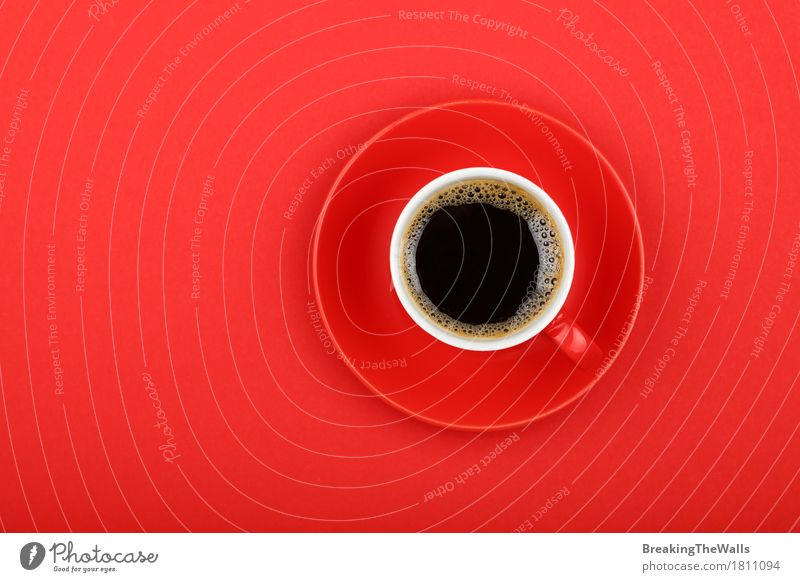 Black coffee in red cup with saucer on red paper, top view Breakfast To have a coffee Beverage Hot drink Coffee Mug To enjoy Aggression Strong Red Might Energy