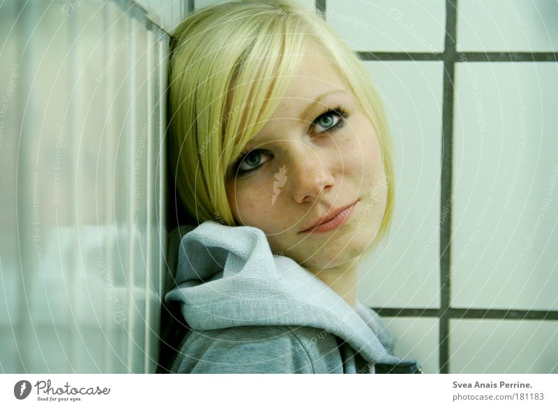 clap Room Bathroom Feminine Young woman Youth (Young adults) 1 Human being Wall (barrier) Wall (building) Jacket Blonde Hang Looking Dream Sadness Wait