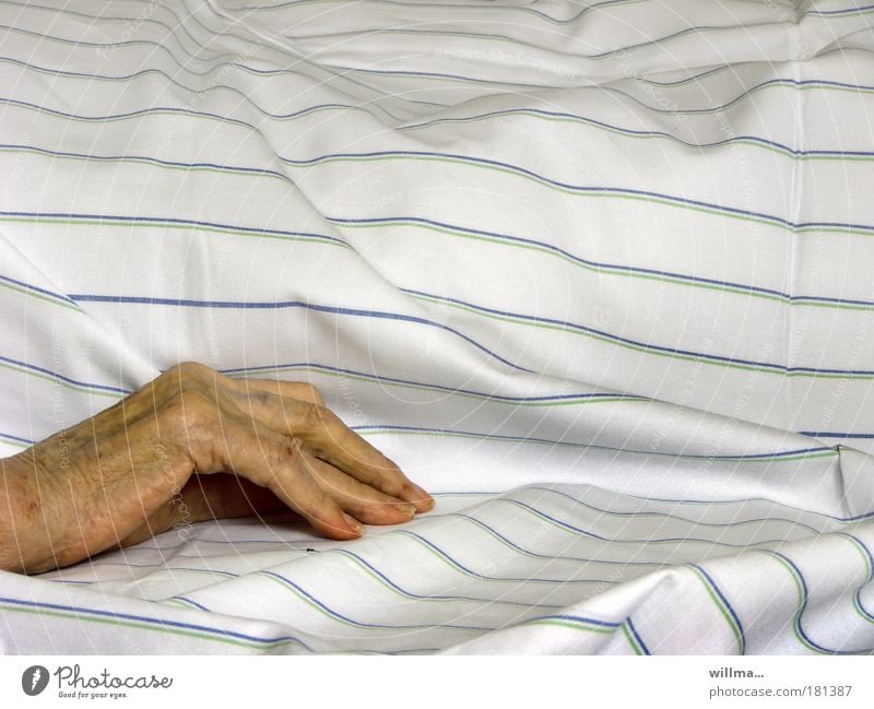 Hand of a senior citizen on a sickbed in a nursing home Patient age Illness Health care Nursing Duvet Retirement pension Home for the elderly