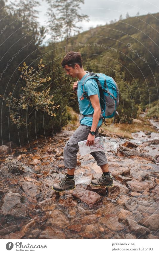 Boy going across a mountain stream Vacation & Travel Adventure Freedom Summer Mountain Hiking Boy (child) 1 Human being 13 - 18 years Youth (Young adults)