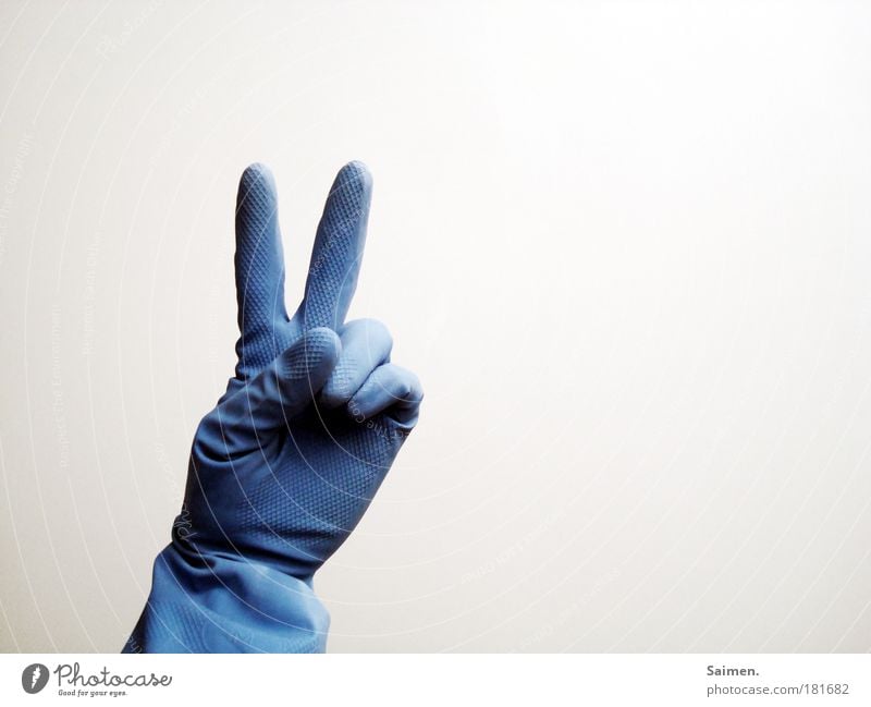 peace baby! Colour photo Subdued colour Interior shot Copy Space right Light Hand Fingers Joy Happy Peaceful Hope Blue Sign Gesture Symbols and metaphors Gloves