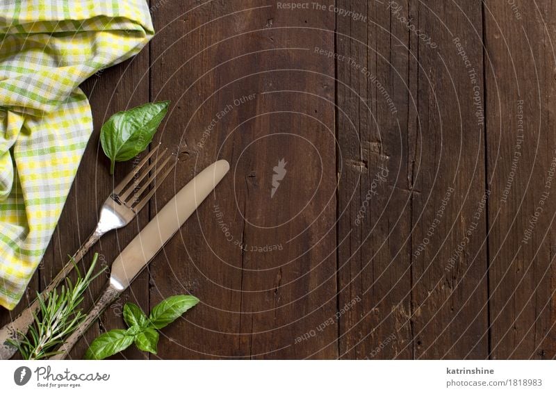 Blank recipe book. Cookbook and green basil leaves on kitchen