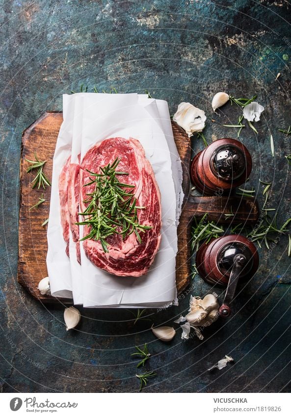 Marbled steaks on the kitchen table Food Meat Herbs and spices Nutrition Dinner Banquet Business lunch Organic produce Crockery Style Design Healthy Eating