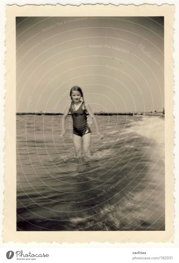 Summer 1937 Black & white photo Exterior shot Looking into the camera Swimming & Bathing Vacation & Travel Summer vacation Beach Ocean Waves Girl 8 - 13 years