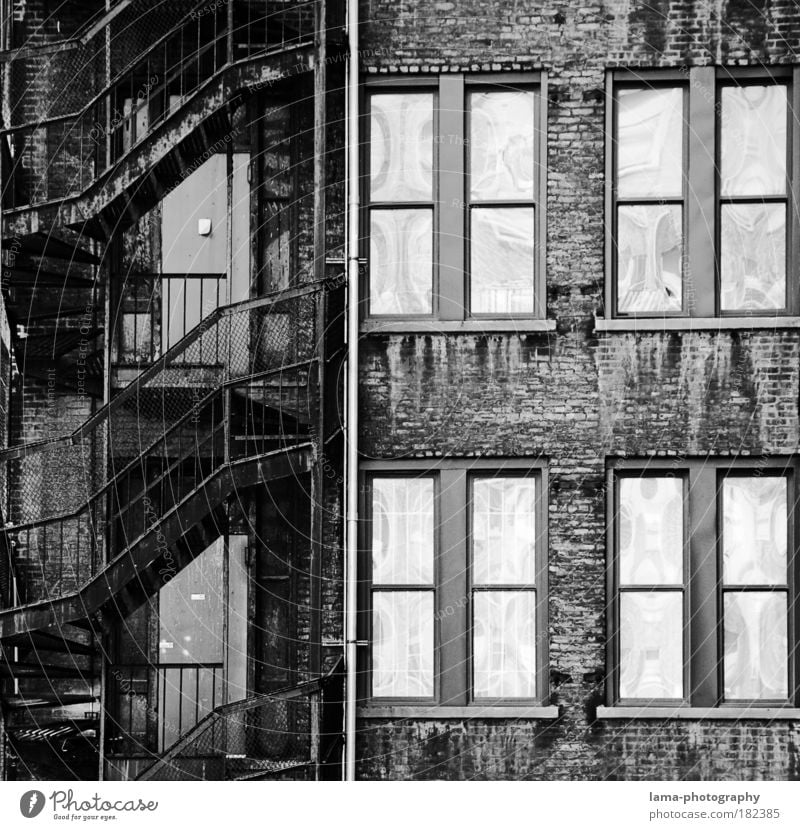 fire escape Black & white photo Detail Structures and shapes Deserted Contrast Reflection Central perspective Long shot New York City Americas USA Town
