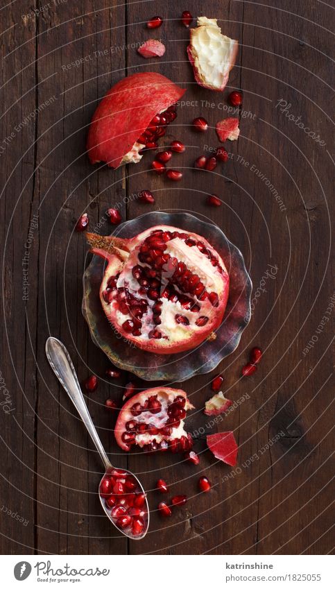 Open fresh ripe pomegranates Fruit Nutrition Vegetarian diet Diet Spoon Exotic Wood Fresh Delicious Juicy Brown Red agriculture antioxidant food Garnet healthy