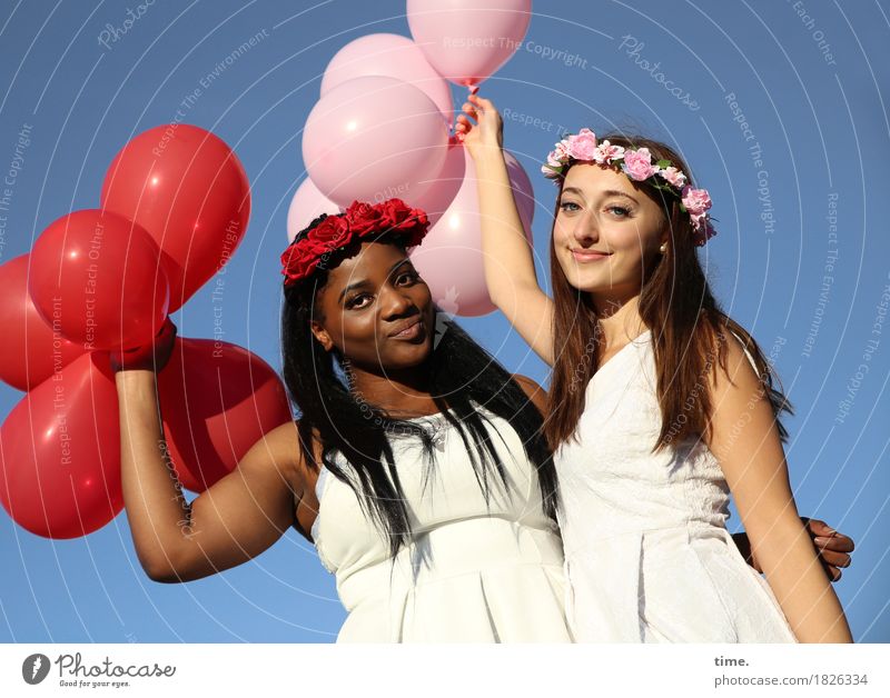 Sonia and Cynthia Feminine Woman Adults 2 Human being Cloudless sky Dress Jewellery Hairband Black-haired Brunette Long-haired Balloon Observe To hold on