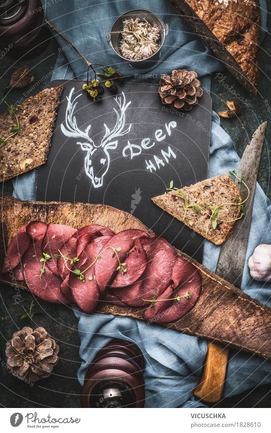 Deer meat ham with bread served on tree bark Food Meat Sausage Bread Herbs and spices Nutrition Lunch Dinner Banquet Crockery Knives Style Design Table
