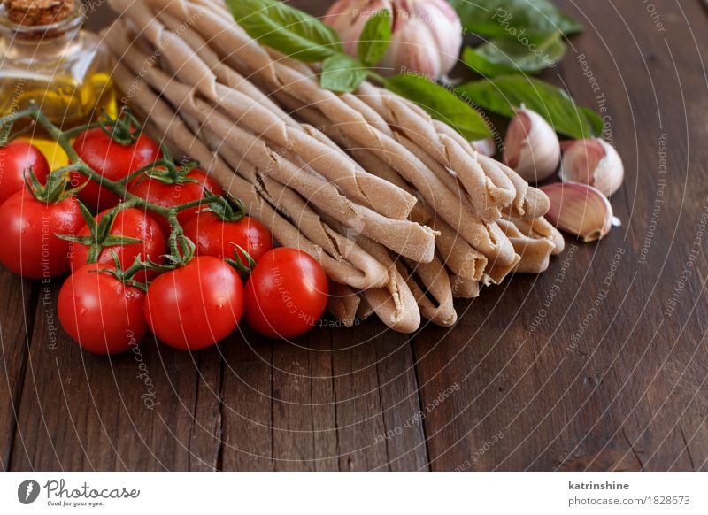 Whole wheat pasta, vegetables, herbs and olive oil Vegetable Dough Baked goods Herbs and spices Vegetarian diet Diet Italian Food Bottle Spoon Table Leaf Dark