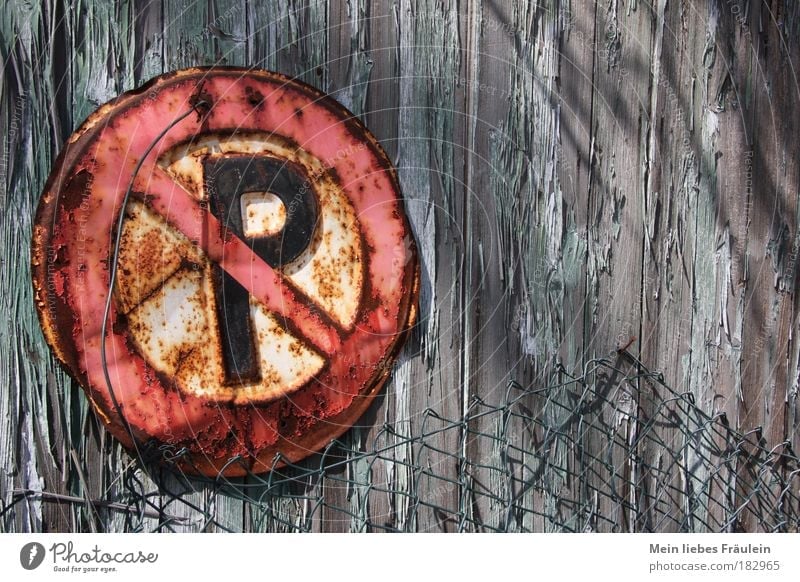 (rusty) offered Colour photo Exterior shot Close-up Deserted Copy Space right Day Light Shadow Sunlight Transport Road traffic Motoring Road sign Parking