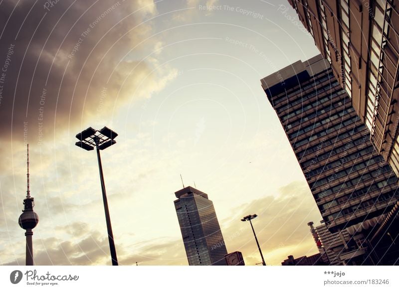 the centre. Colour photo Exterior shot Deserted Evening Twilight Worm's-eye view Sky Berlin Alexanderplatz Town Capital city Downtown Skyline High-rise Building