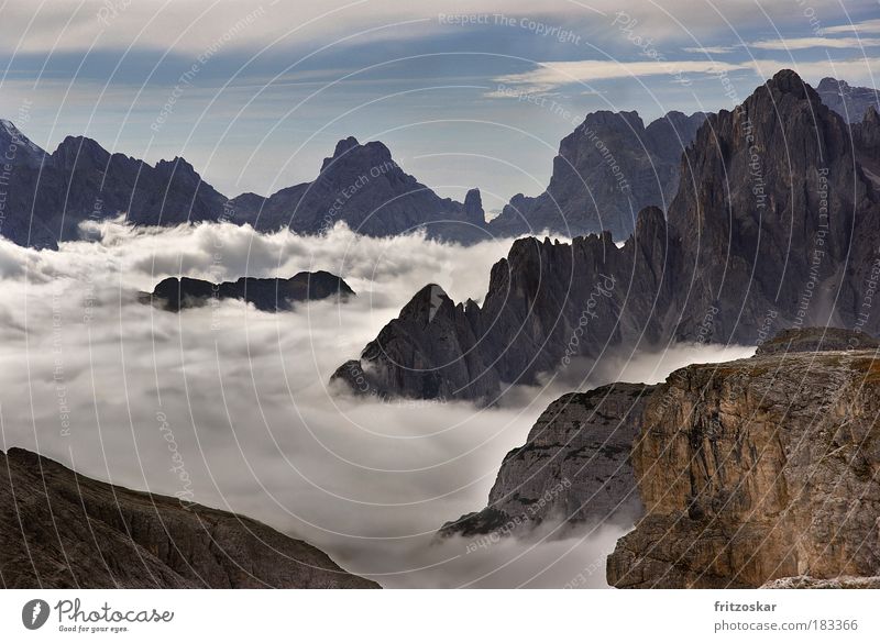 carpet of clouds Colour photo Exterior shot Deserted Contrast Panorama (View) Tourism Far-off places Freedom Mountain Nature Landscape Sky Clouds Fog Rock Alps