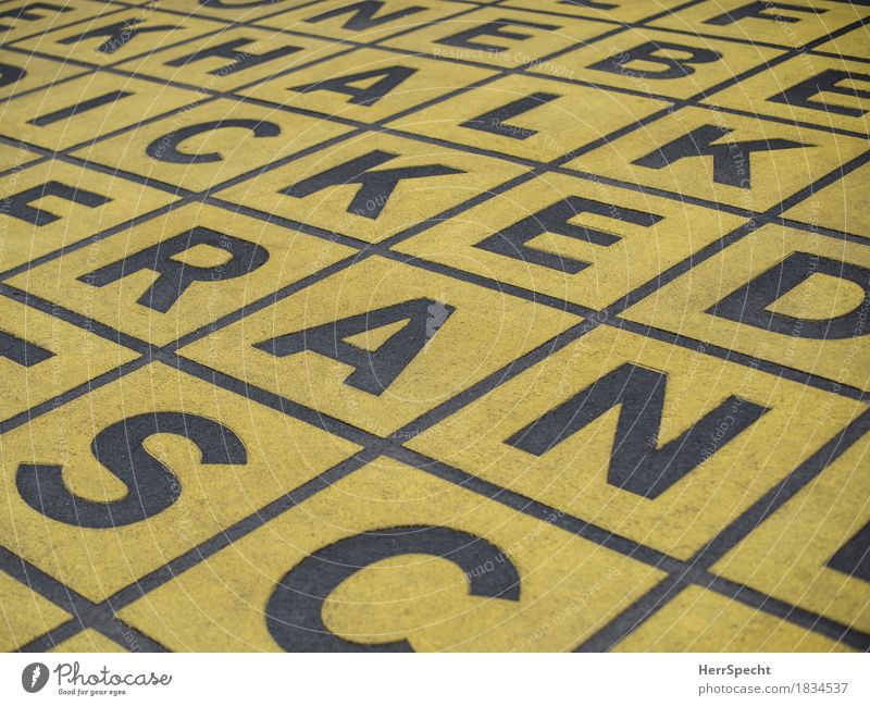 C A K A N E L E N S R C H Art Characters Yellow Black Letters (alphabet) Square Ground painted on Illustration Graph Background picture Graphic Colour photo