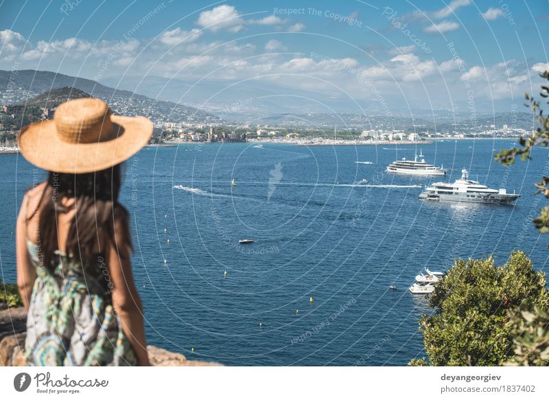 Woman with summer hat watching yachts Lifestyle Luxury Happy Beautiful Relaxation Vacation & Travel Tourism Cruise Summer Beach Ocean Human being Girl Adults